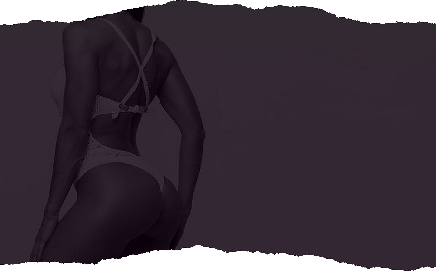 Model in stylish swimwear against dark background.