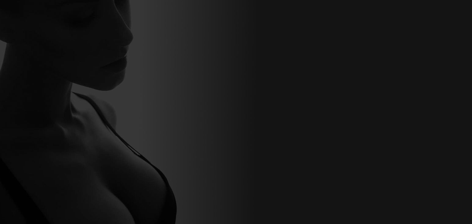 Profile of a woman in soft lighting.