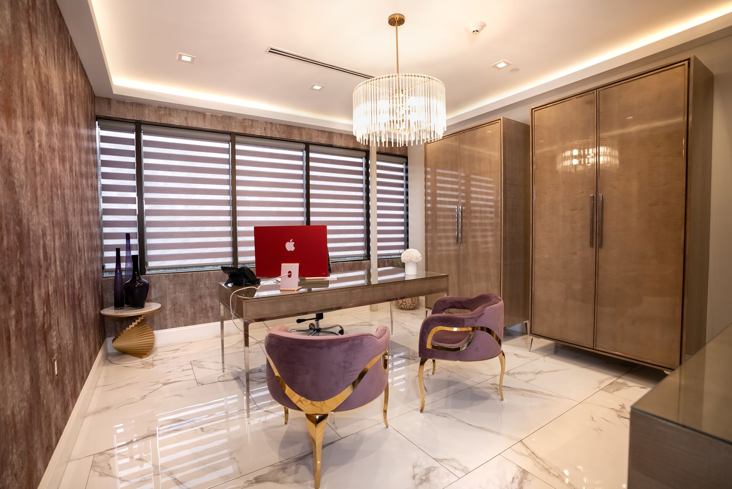 Skincare products displayed on a stylish shelf.