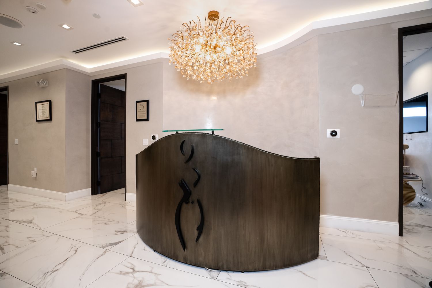 Modern reception area with elegant decor and furniture.