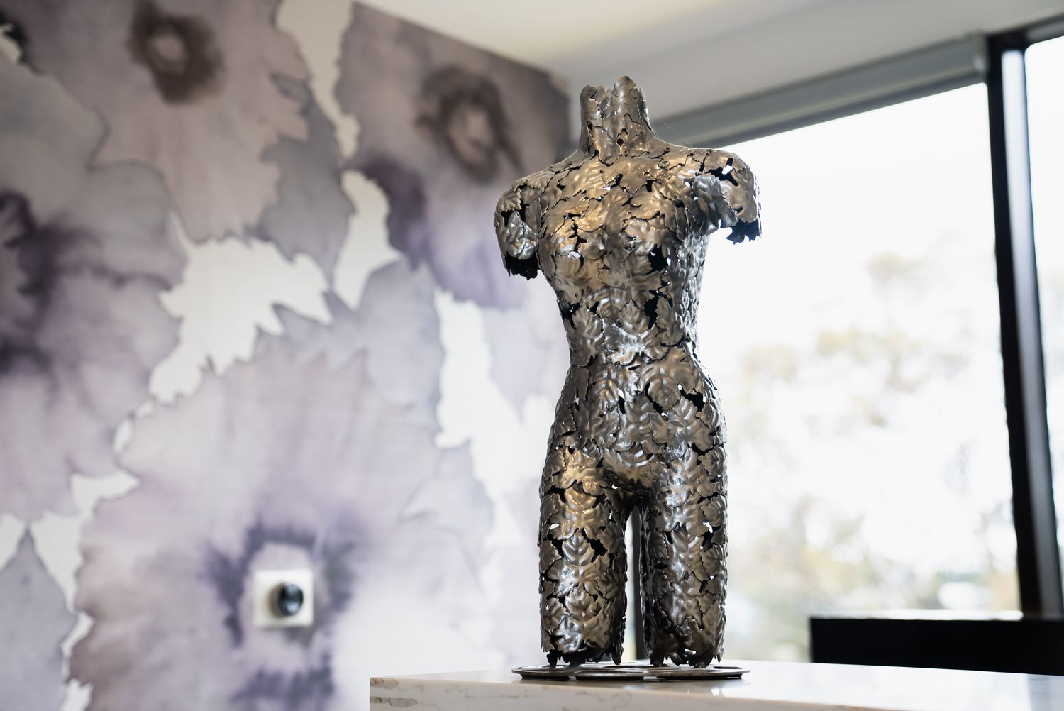 Modern reception area with elegant decor and furniture.