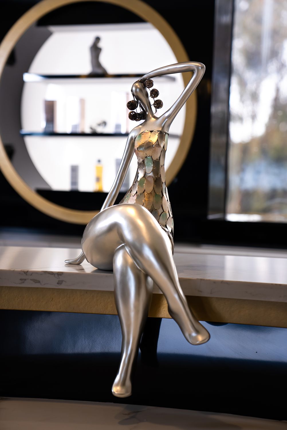 Skincare products displayed on a stylish shelf.