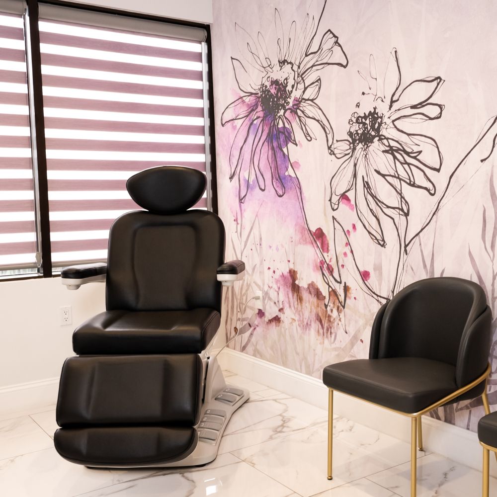 Orchid arrangement on stylish coffee table.