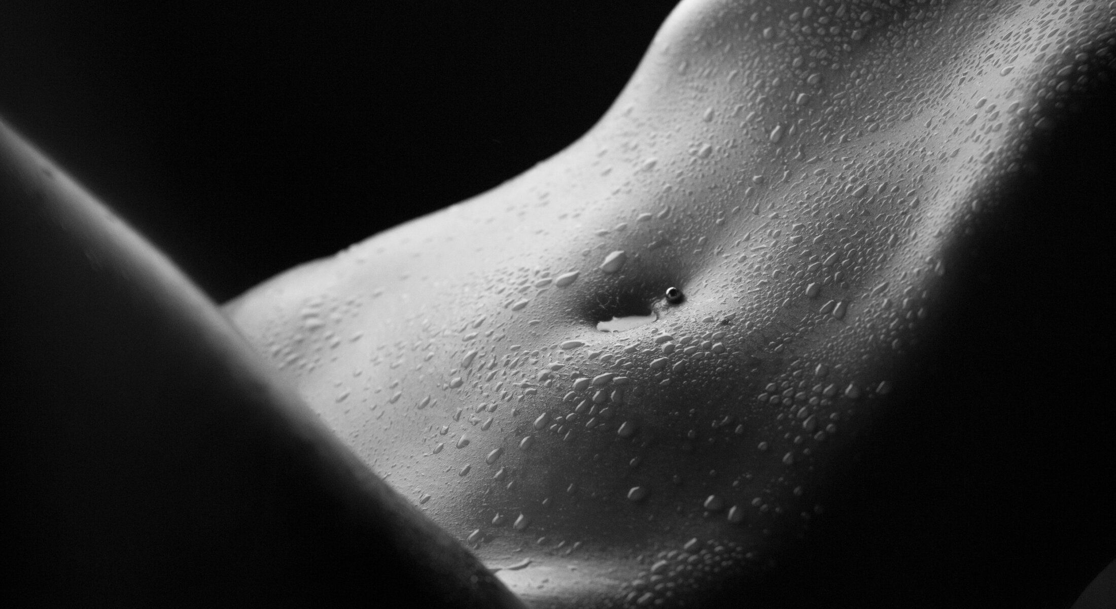 Dewy skin close-up in black and white.