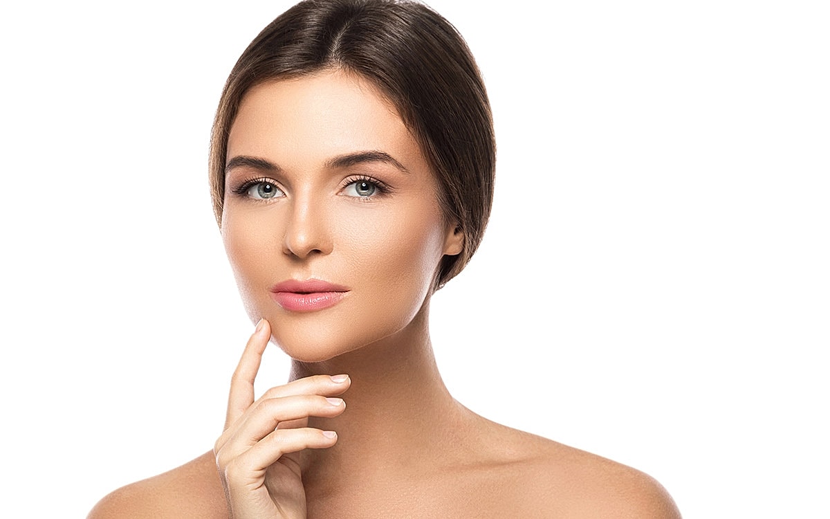 Beautiful woman with soft makeup on white background.