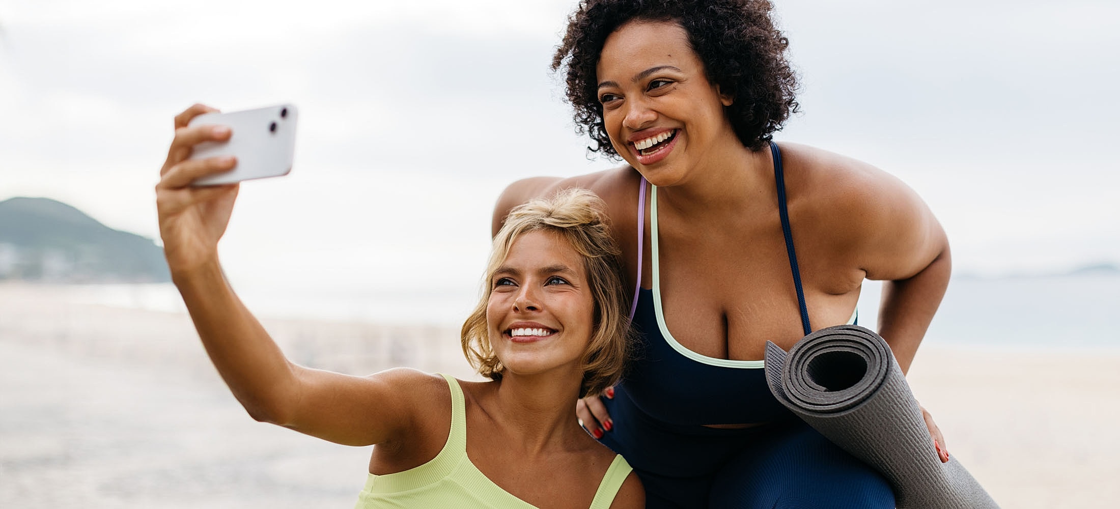 Friends taking a selfie after a workout.