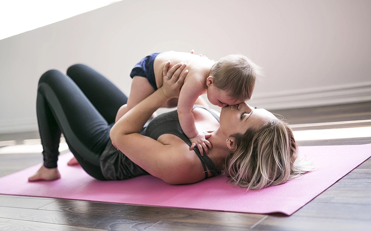 Mother and baby sharing an affectionate moment.