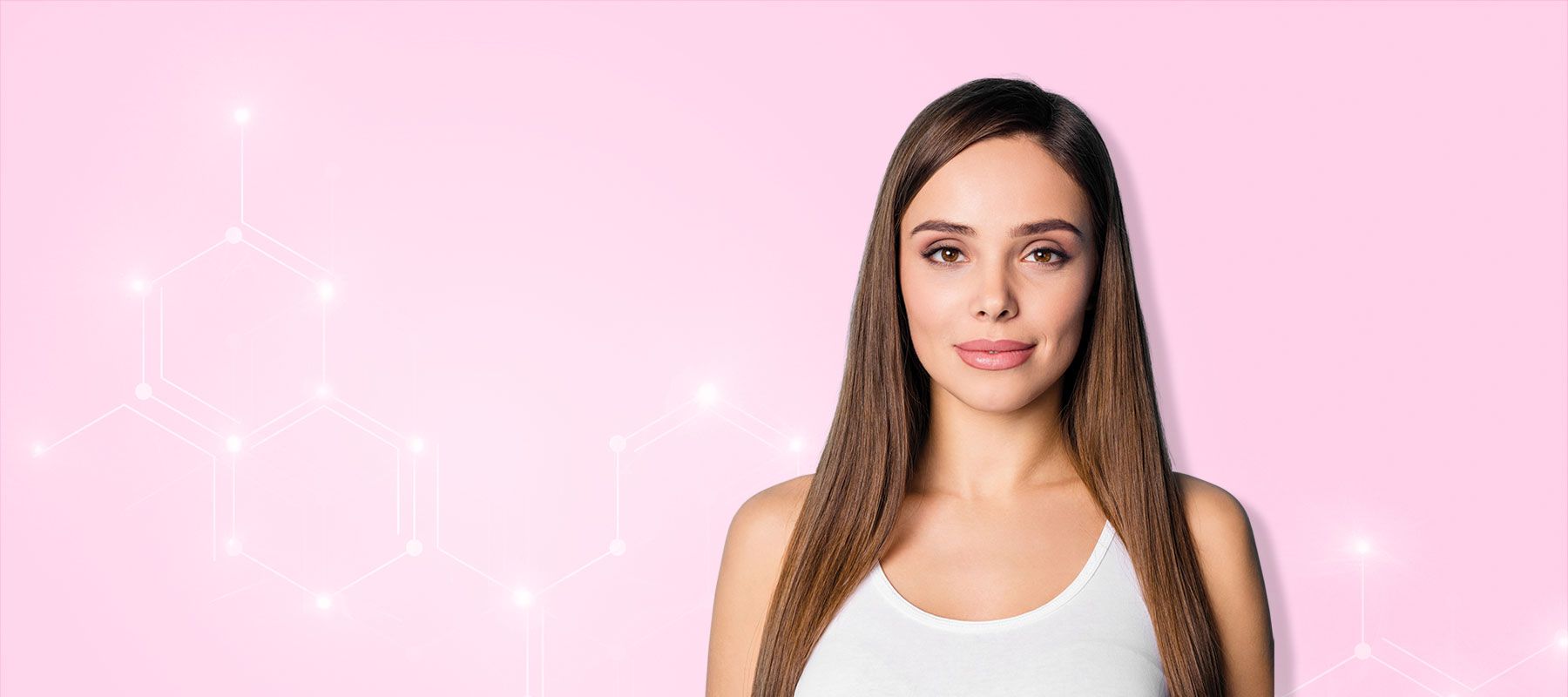 Woman with long hair on pink background