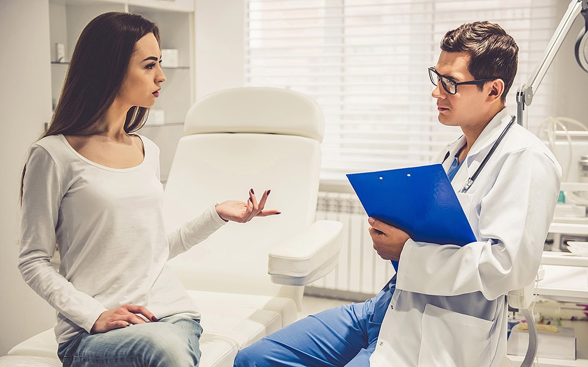 Patient discussing concerns with a doctor.