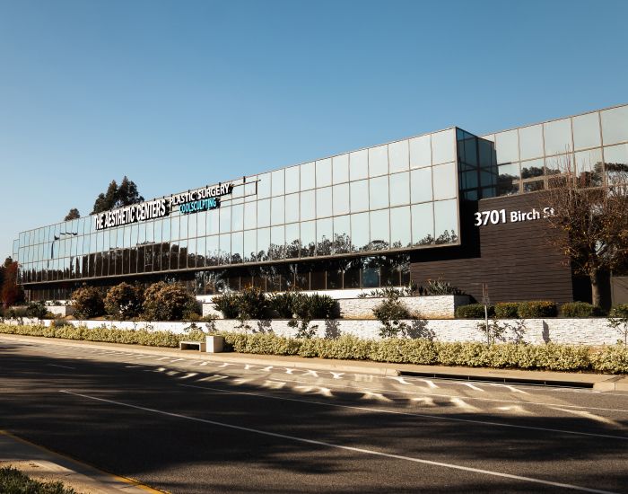 Modern aesthetic surgery center building exterior.