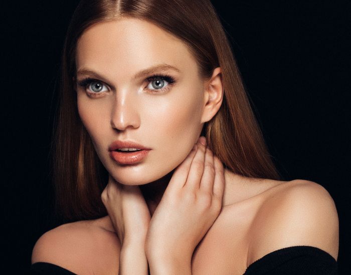 Portrait of a woman with long hair.